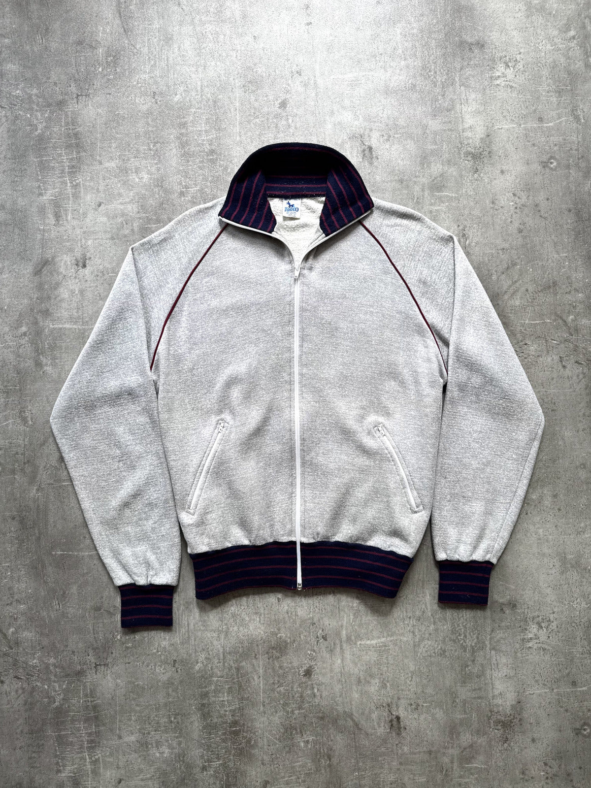 Vintage 1980's Rodeo Fleece Lined Raglan Sleeve Stripe Collar Track Sweatshirt.