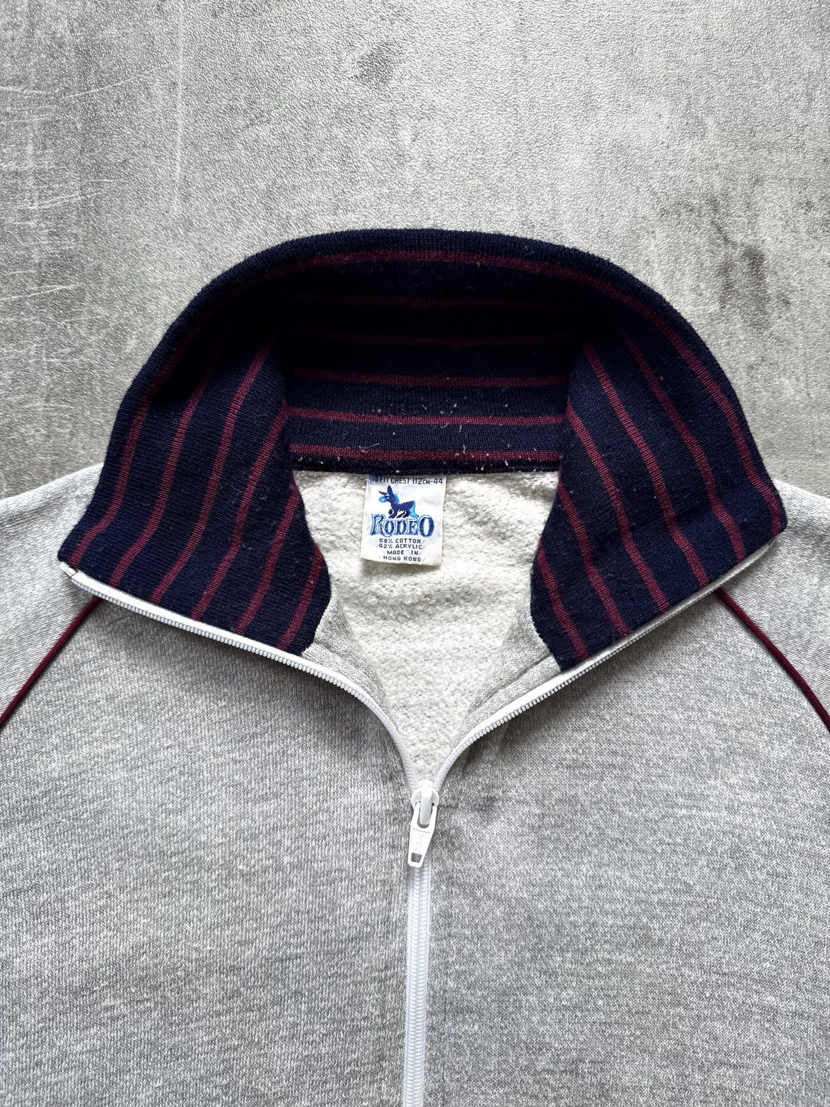 Vintage 1980's Rodeo Fleece Lined Raglan Sleeve Stripe Collar Track Sweatshirt.