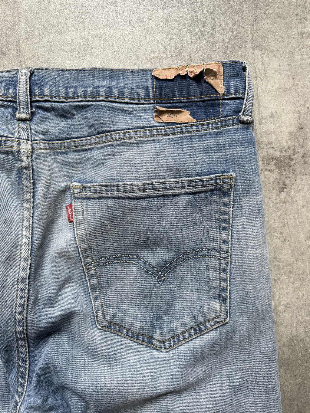 Vintage 2000’s Levis 508 Patched & Thrashed Mid Blue Denim Jeans.