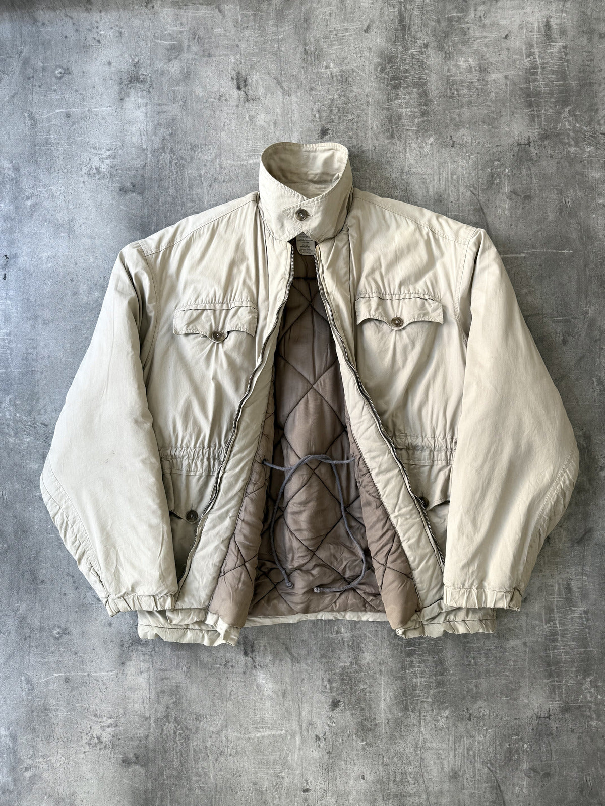 1990’s Paul Smith Made in England RiRi Zip Quilted Cycling Coat.