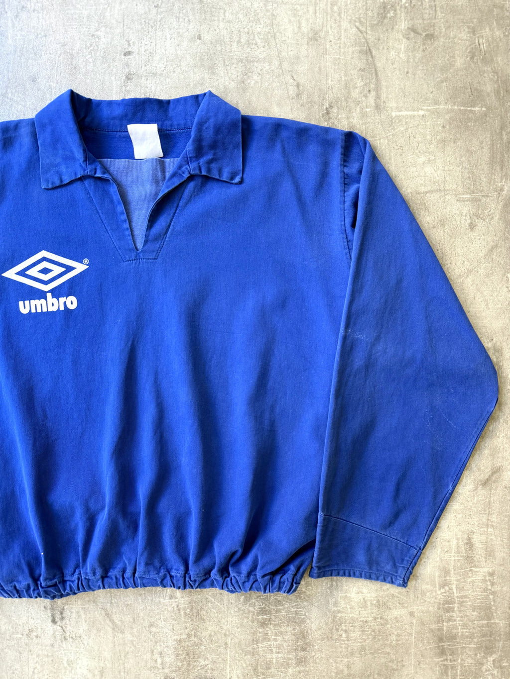 Vintage 1980's Umbro Royal Blue Pullover Graphic Drill Smock.