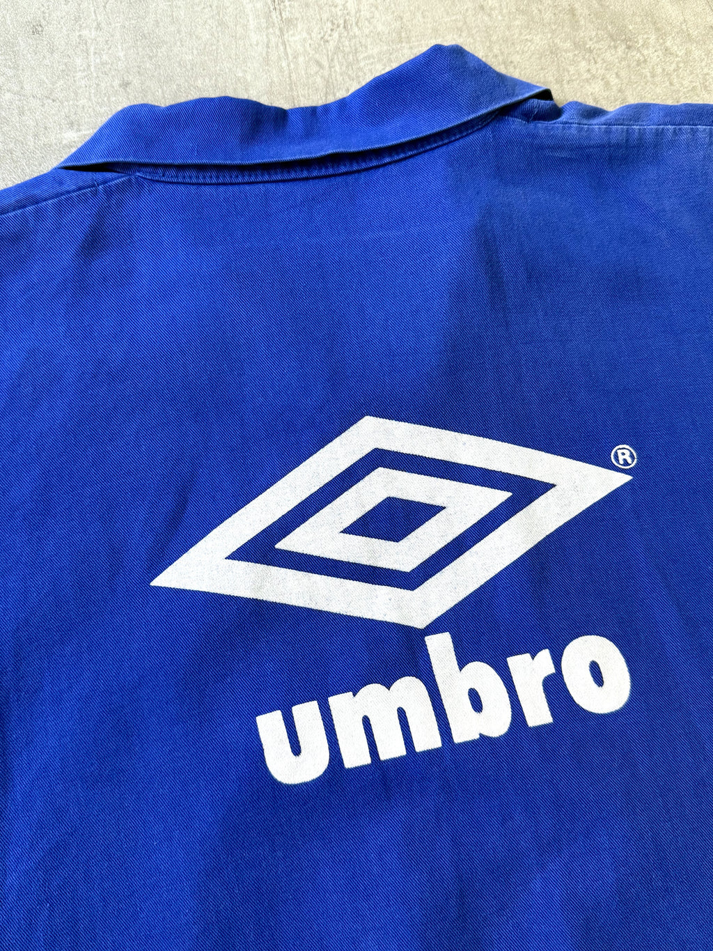 Vintage 1980's Umbro Royal Blue Pullover Graphic Drill Smock.